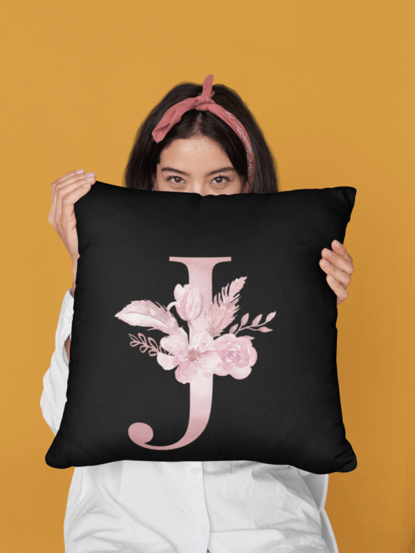 Custom Printed Monogram Letter J on Black Pillow Case mockup of a woman covering her face with a pillow