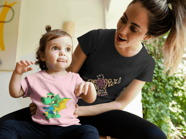 Dinosaur Dragon on Toddler T-Shirt mockup of a mom and baby girl wearing different tshirts pink & black while talking