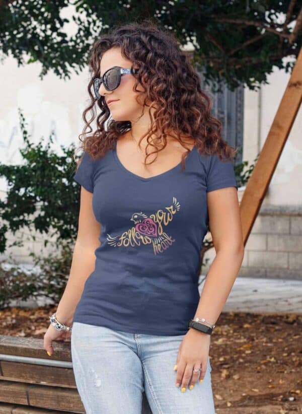 Follow Your Heart Ladies V-Neck T-Shirt Inspirational Design Navy mockup of a curly haired woman wearing a deep v neck t-shirt