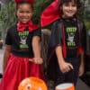 Boy and girl going trick or treating wearing Creep It Real T-Shirt