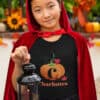 Girl holding Lantern in Halloween costume