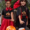 Boy and girl going trick or treating
