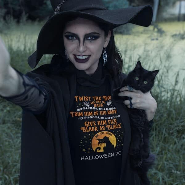 Girl holding a cat in a Twist The Bones Custom Halloween T-shirt